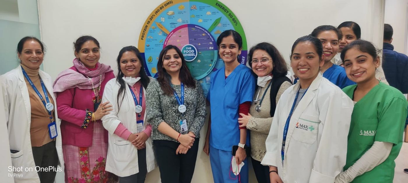 Dr Aditi Chaturvedi with colleagues at a breast cancer awareness event