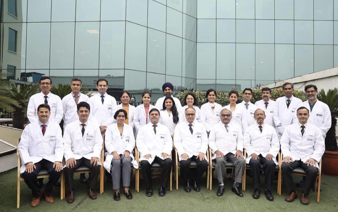 Dr Aditi Chaturvedi with the surgical oncology team, in a group photograph outside the hospital